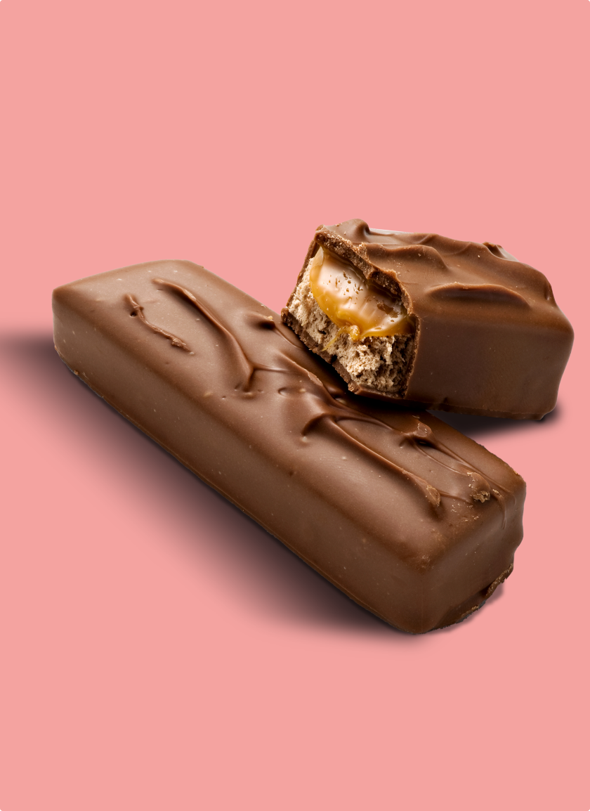 A chocolate bar on a pink background.